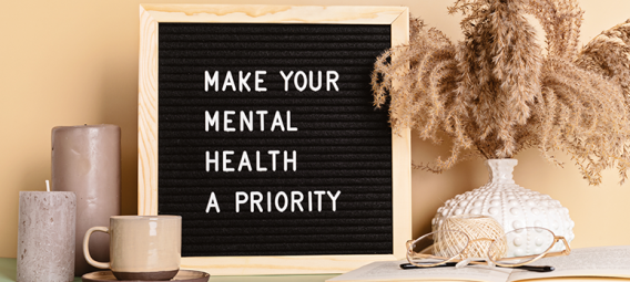Make your mental health a priority motivational quote on the letter board. 