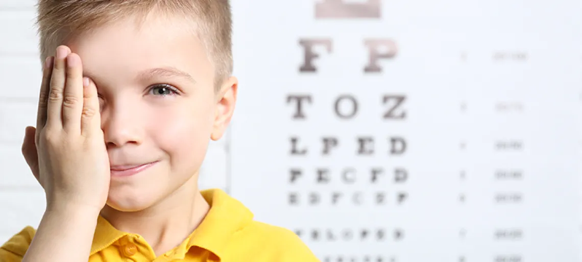 Little boy having eye test at ophthalmologist office