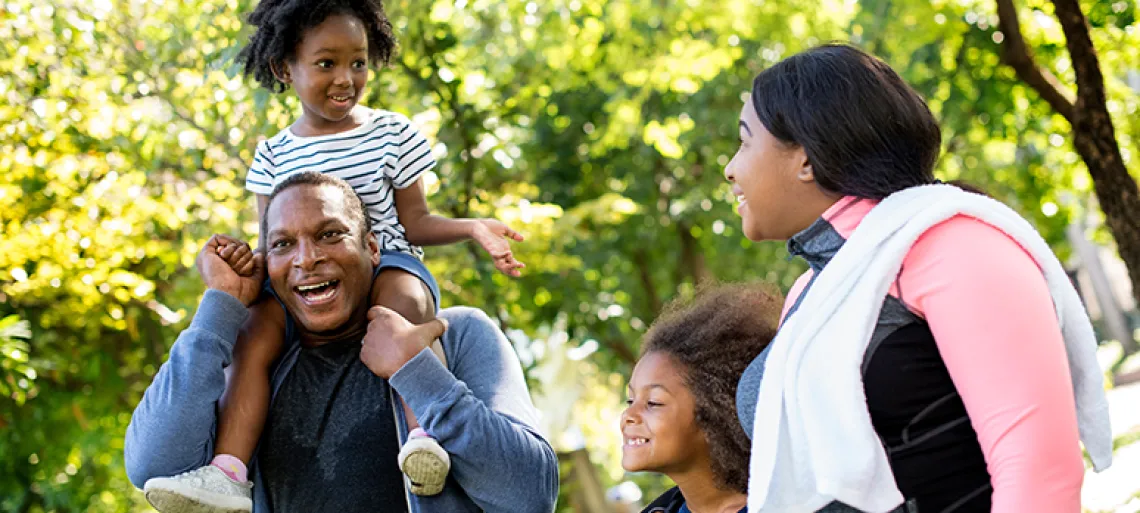 African American family enjoying time together outside