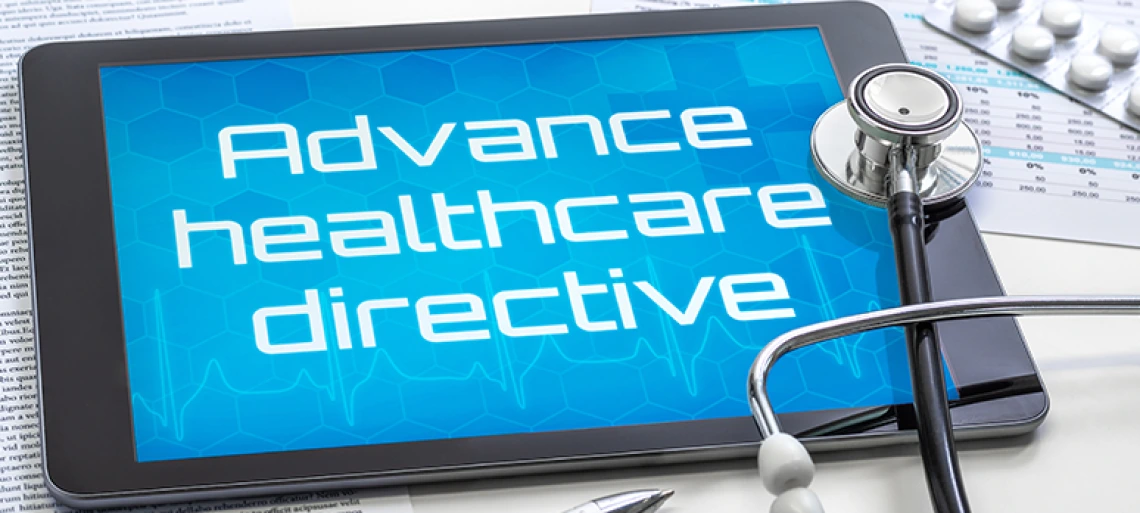 A tablet with the word Advanced healthcare directive on the display