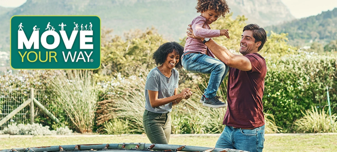 Parents playing with children outdoors in natural setting with 'MOVE YOUR WAY' logo, promoting family physical activity and active lifestyle in beautiful landscape