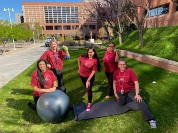 Team Medical Imaging and a team strength and stretch session during Move Arizona 2024.