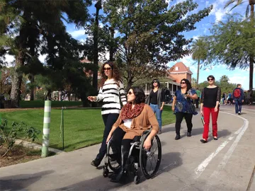 Faculty and Staff walking on campus