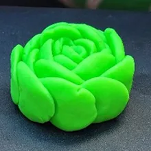 Glow-in-the-dark green play-doh shaped as a flower