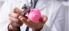 Doctor Checking Piggybank With Stethoscope